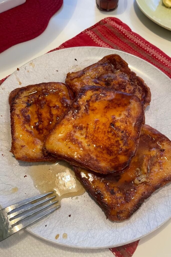 Easy French toast recipe with maple syrup drizzled on top