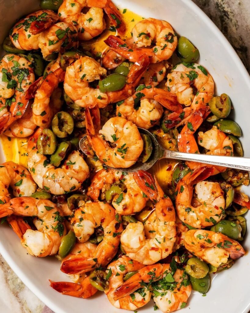 Garlic butter shrimp cooked in skillet with lemon and parsley
