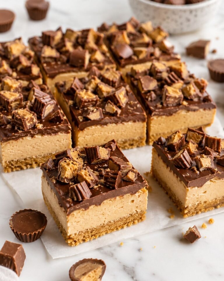 Peanut butter cup bars with creamy filling and chocolate topping